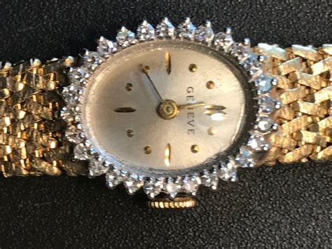 geneve 14k gold diamond watch.